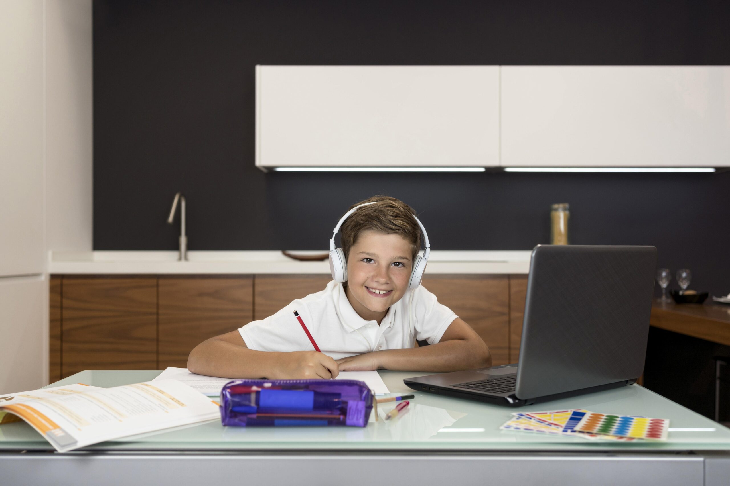 adorable-young-boy-doing-his-homework